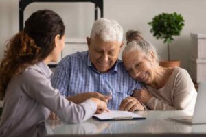 Elder couple securing their retirement pension fund with their attorney